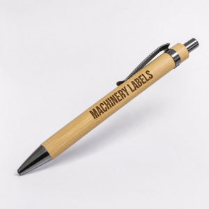 Engraved bamboo pen with laser engraved branding and chrome trim on a clean studio background